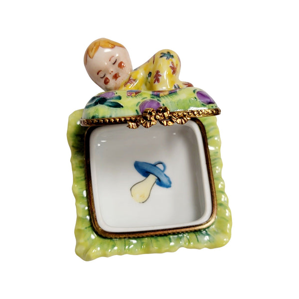 Blond Baby Doll on Pillow Porcelain Limoges baby figurine French Trinket Box