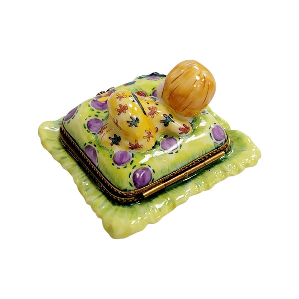 Blond Baby Doll on Pillow Porcelain Limoges baby figurine French Trinket Box