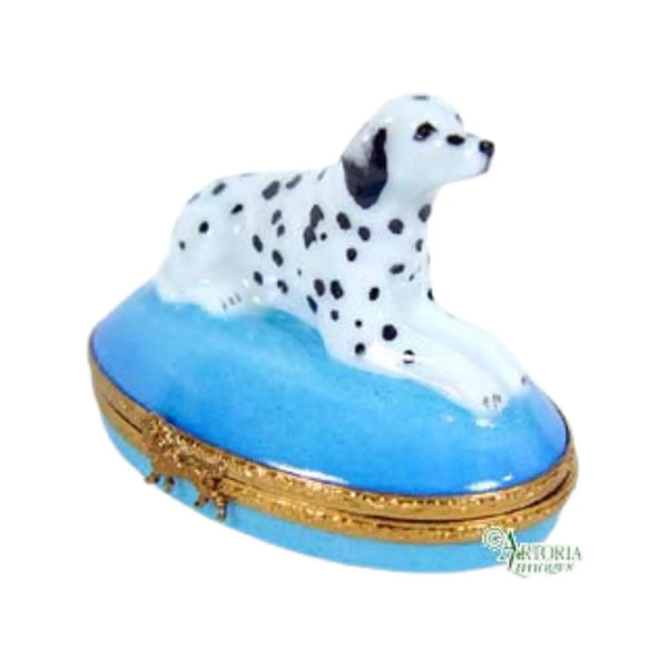 Artoria decorative trinket box featuring a Dalmatian dog figurine on a blue base with gold trim