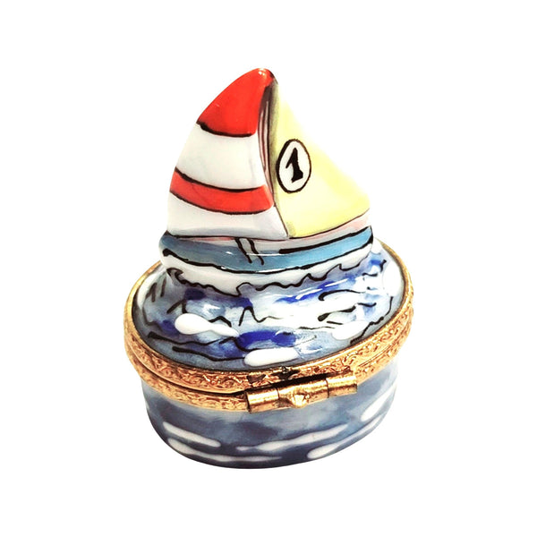Vintage Limoges hand-painted sailboat trinket box with gold clasp and detailed ocean waves