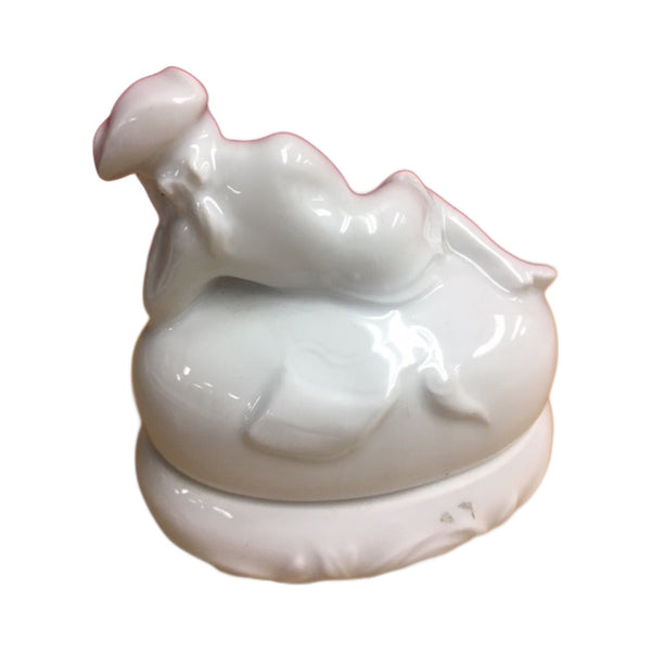 Detail of the hunter on the white Limoges porcelain box