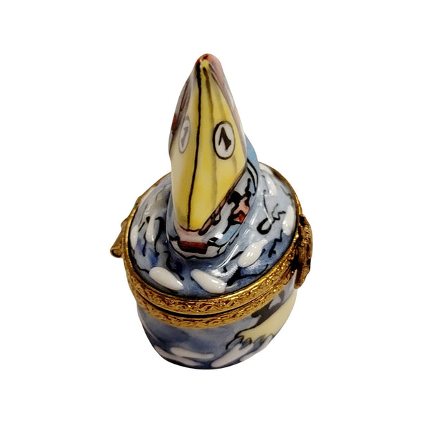 Vintage Limoges porcelain sailboat trinket box with hand-painted details and gold clasp