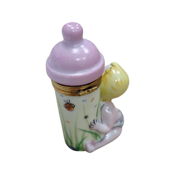 Baby w Pink Bottle Porcelain Limoges Trinket Box