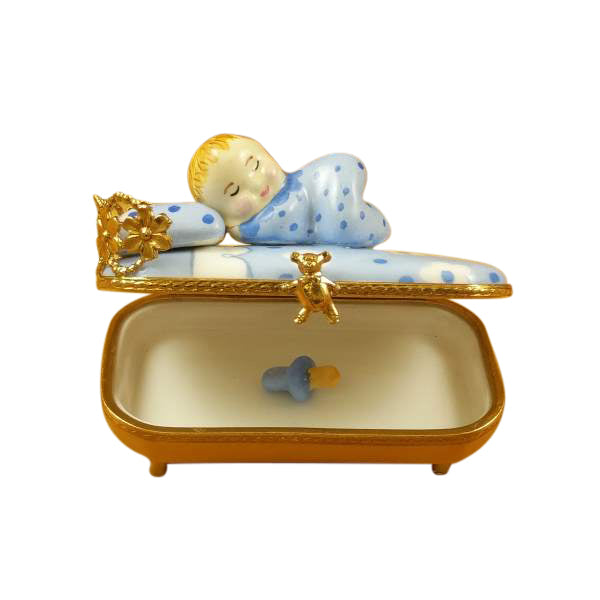 Baby in Blue Bed with Pacifier Limoges Porcelain Box