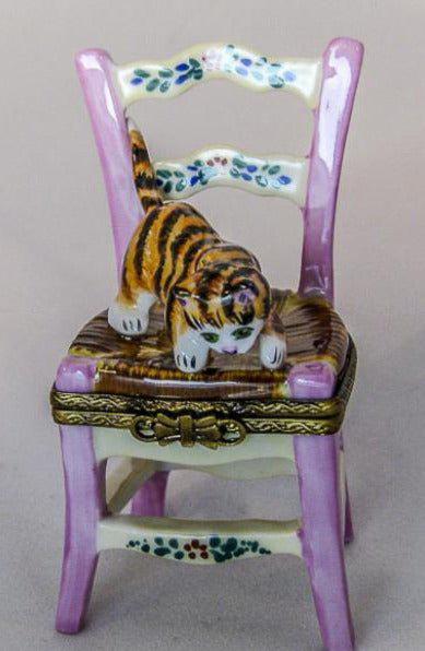 Cat playing on Chair